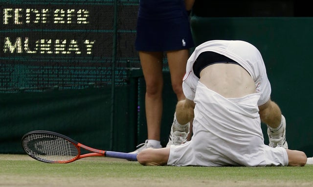 Andy Murray takes a tumble during the men's singles final match 