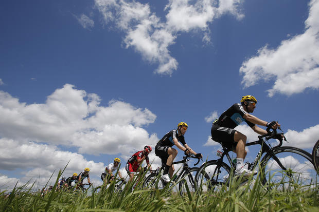 Mark Cavendish and new overall leader Bradley Wiggins ride during the seventh stage of the Tour de France 
