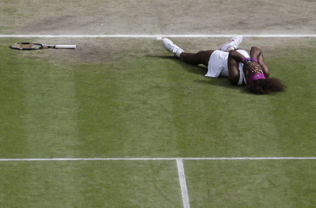 Serena Williams reacts after defeating Agnieszka Radwanska 