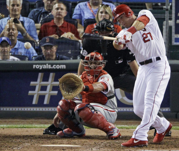 Mike Trout hits a single during the sixth inning 