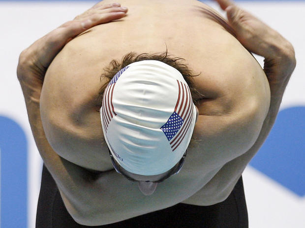 Michael Phelps prepares for a men's 200 meters Butterfly heat 
