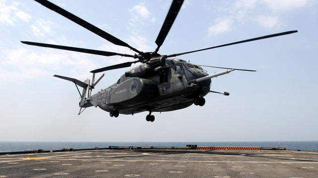 An MH-53E Sea Dragon helicopter assigned to Helicopter Mine Countermeasures Squadron 15 prepares to land on the flight deck aboard the USS Ponce July 4, 2012, in the Persian Gulf. 