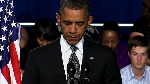 Obama holds moment of silence for Colo. Victims   