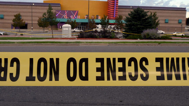 Crime scene tape surrounds the Century 16 movie theater where 12 people were killed in a shooting rampage July 23, 2012, in Aurora, Colo. 