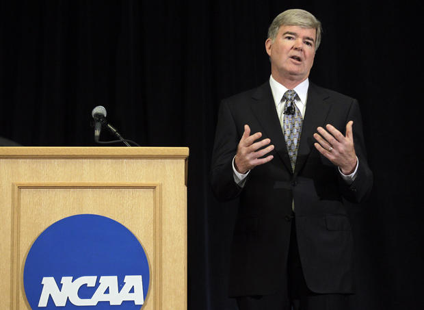 Mark Emmert gestures during a news conference in Indianapolis 