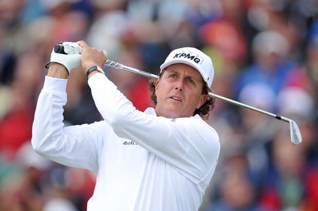 Phil Mickelson tees off on the fifth hole 