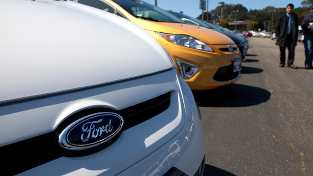Braking auto sales overseas lower earnings in Detroit 