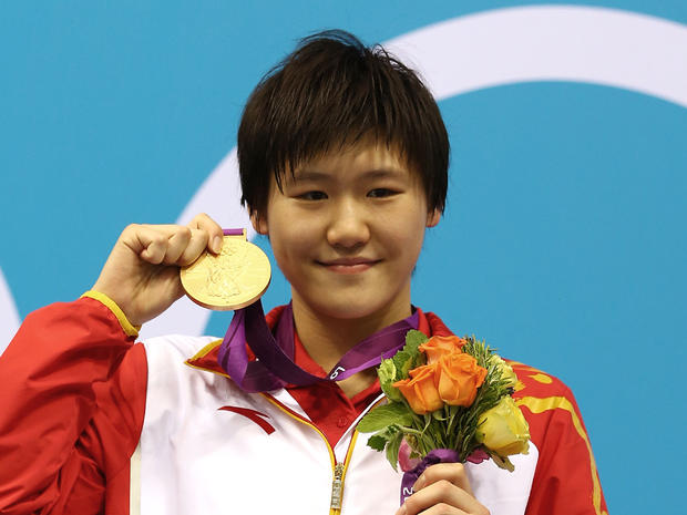 Ye Shiwen shows off her gold, won in the Women's 400m Individual Medley 