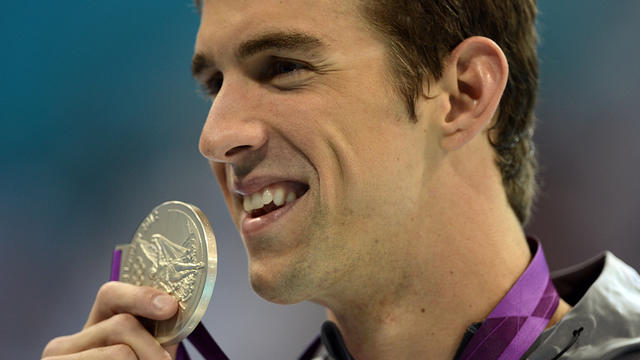 Phelps makes Olympic history with 19th medal 