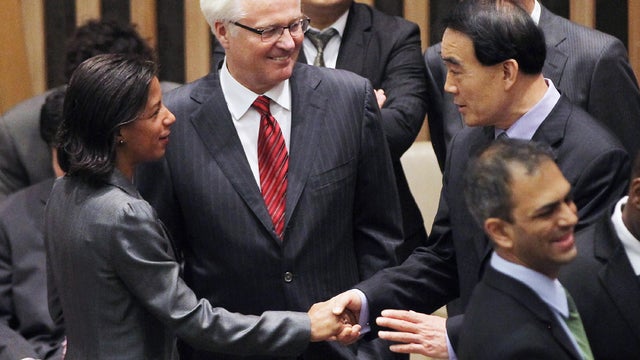 U.S., Russian and Chinese U.N. ambassadors chat before a Security Council vote 