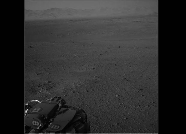A view from one of Curiosity's navigation cameras shows the rim of Gale Crater, the rover's landing spot. 