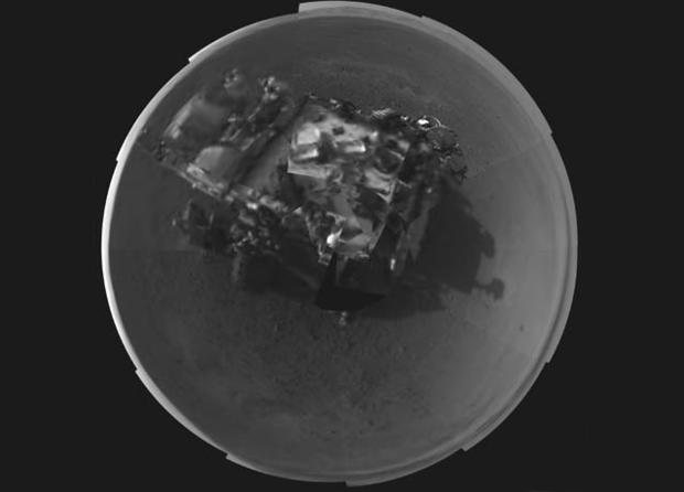 In this image released by NASA on Wednesday, Aug. 8, 2012, a self portrait of NASA's Curiosity rover was taken by its Navigation cameras, located on the now-upright mast. The camera snapped pictures 360-degrees around the rover. 