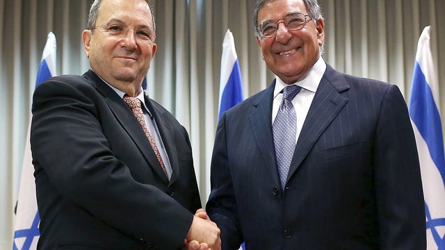 Secretary of Defense Leon Panetta shakes hands with Israeli Defense Minister Ehud Barak 