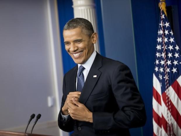 US President Barack Obama smiles while h 