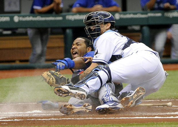 Edwin Encarnacion reacts as he is tagged out by Jose Lobaton  
