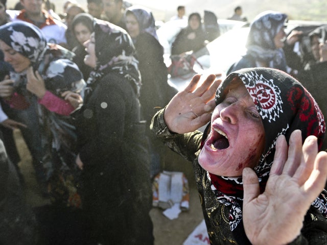 Iranian woman grieves after her loved ones were killed during Saturday's earthquakes 