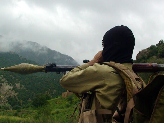 A Pakistani Taliban militant holds a rocket-propelled grenade at the Taliban stronghold of Shawal in Pakistani tribal region of Waziristan along the Afghan border Aug. 5, 2012. 