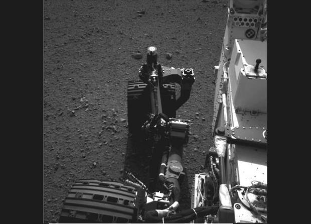 This still from a set of images shows the movement of the front left wheel of NASA's Curiosity as rover drivers turned the wheels in place at the landing site on Mars. Engineers wiggled the wheels as a test of the rover's steering 