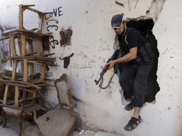 A Sunni gunman is seen during clashes in Tripoli, Lebanon 