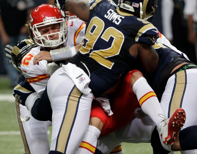 Ricky Stanzi is sacked for a seven-yard loss 