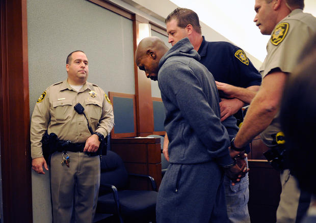 Boxer Floyd Maywether Jr. is led away in handcuffs at the Clark County Regional Justice Center as he surrenders to serve a three-month jail sentence at the Clark County Detention Center on June 1, 2012, in Las Vegas 