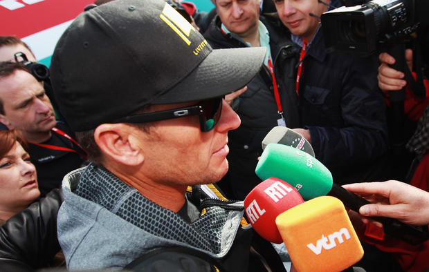 Lance Armstrong attends the 2012 Paris Roubaix cycle race 
