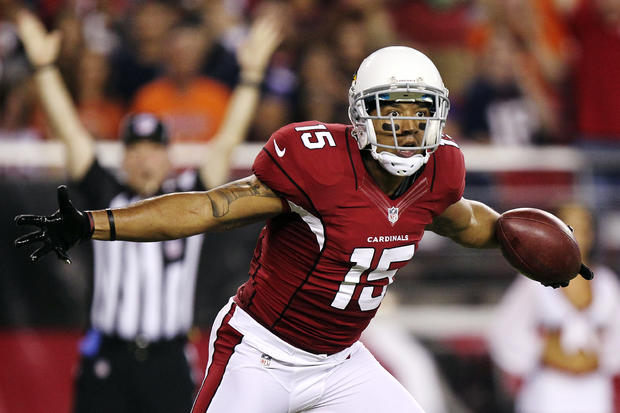 Michael Floyd reacts to scoring a touchdown 