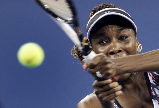Venus Williams keeps her eyes on the ball as she returns to Angelique Kerber 