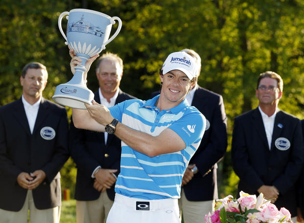 Rory McIlroy holds the trophy after winning the Deutsche Bank Championship 