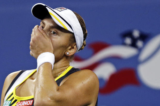 Nadia Petrova, of Russia, reacts after losing a point to Maria Sharapova 