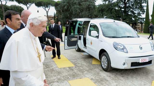 Pope Benedict XVI is presented with an electric car in Castel Gandolfo, in the outskirts of Rome, Wednesday, Sept. 5, 2012. 