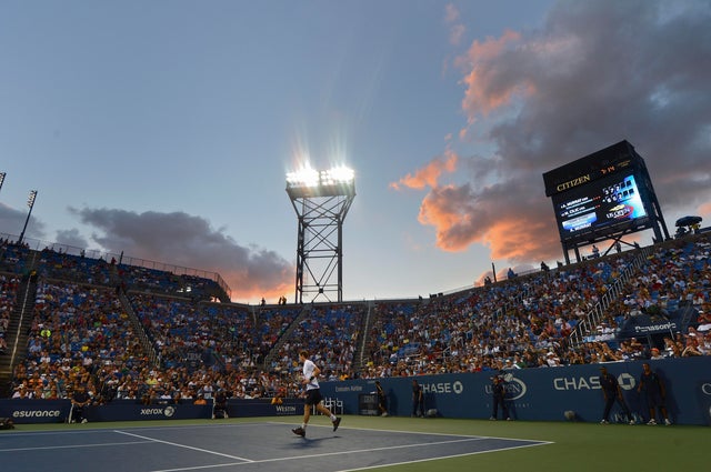 Andy Murray  jogs off the court during a break 
