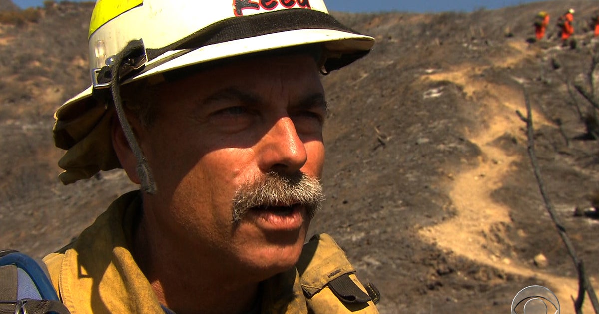 Long summer of wildfires puts strain on firefighters, budgets - CBS News