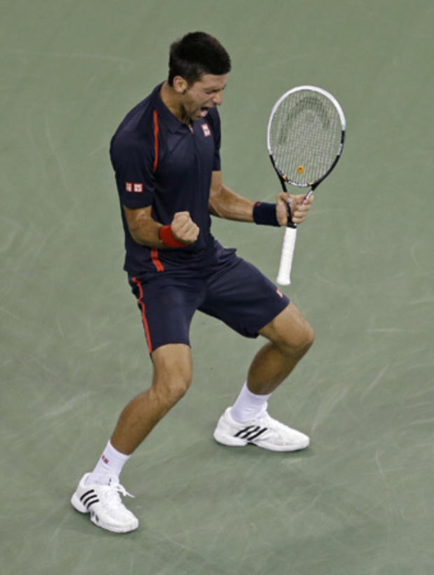 Novak Djokovic reacts after winning the second set against Juan Martin del Potro 