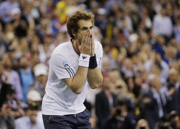 Andy Murray reacts after beating Novak Djokovic  