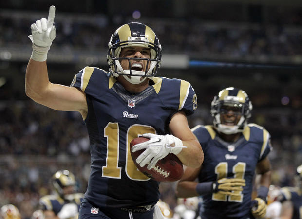 Danny Amendola celebrates after catching a 1-yard touchdown  