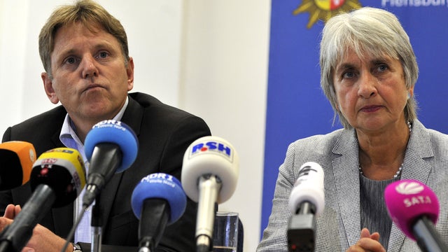 Dirk Czarnetzki, head of the greater Flensburg area criminal police, left, and head prosecutor Ulrike Stahlmann-Liebelt speak during a press conference in Flensburg, Germany, Sept. 27, 2012. 