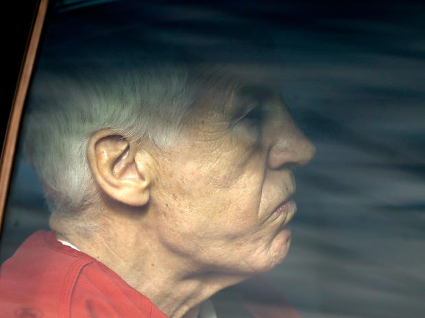Former Penn State University assistant football coach Jerry Sandusky is driven from the Centre County Courthouse after being sentenced in Bellefonte, Pa., Tuesday, Oct. 9, 2012. Sandusky was sentenced to at least 30 years in prison, effectively a life sentence, in the child sexual abuse scandal that brought shame to Penn State and led to coach Joe Paterno's downfall. 
