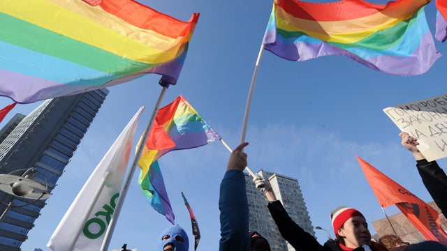 Gay rights activists take part in an anti-Putin rally in the central Arbat area in Moscow, on March 10, 2012. 