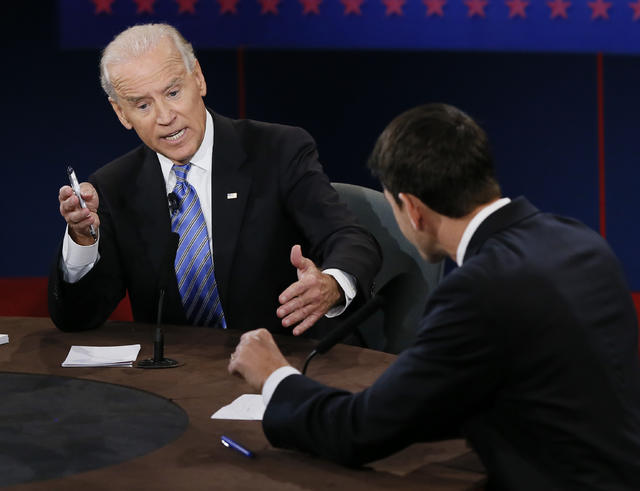 Janna Ryan, wife of Republican vice presidential nominee Rep. Paul Ryan, of  Wisconsin, right, gets a kiss from Vice President Joe Biden following the  vice presidential debate at Centre College, Thursday, Oct. 11, 2012, in  Danville, Ky. (AP Photo/Eric 