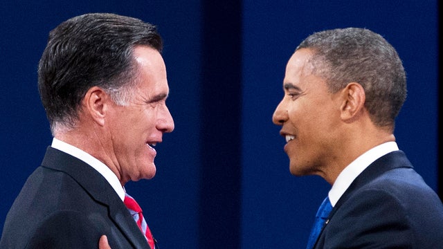 Republican presidential candidate, former Massachusetts Gov. Mitt Romney shakes hands with President Barack Obama before the start of the third presidential debate on Monday, Oct. 22, 2012, in Boca Raton, Fla. 