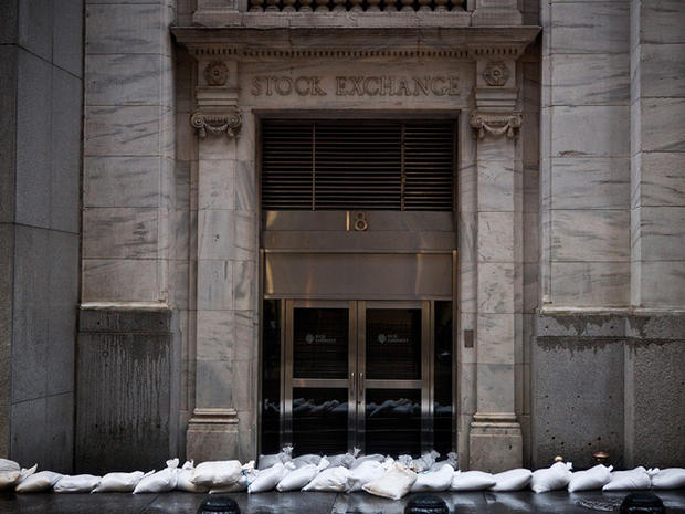 Sandbags barricade the New York Stock Exchange on October 29, 2012, ahead of the arrival of superstorm Sandy. 