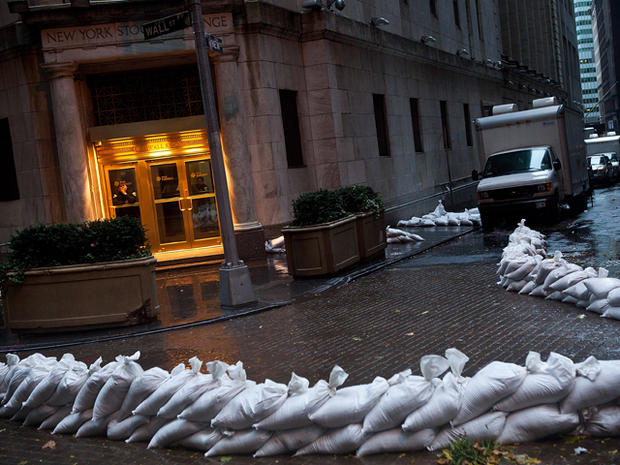 The closed New York Stock Exchange is barricaded with sand bags during the arrival of Hurricane Sandy on October 29, 2012. 