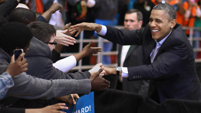 President Obama greets supporters on the campus of the University of Cincinnati 