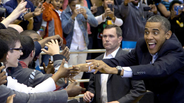 President Obama greets a cheering crowd  