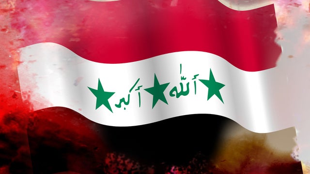 Security forces inspect the scene of a car bomb attack in Basra, 340 miles southeast of Baghdad 