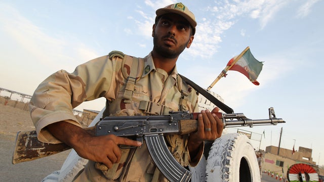 Iranian soldiers keep watch at a patrol post in Zabol, southeastern Iran 