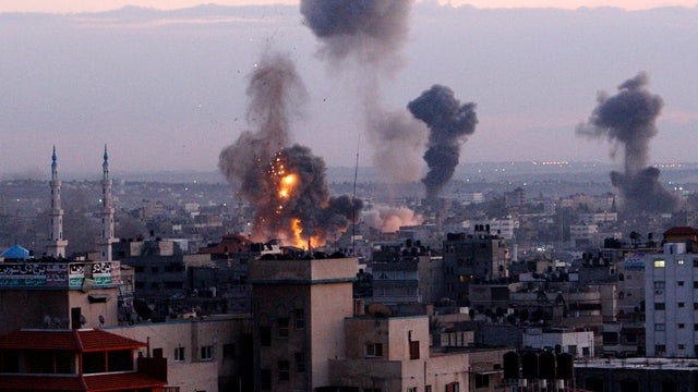Columns of smoke rise following an Israeli air strike in Gaza City Nov. 14, 2012. 