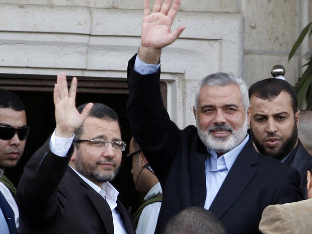 Gaza's Hamas Prime Minister Ismail Haniyeh, right, and Egyptian Prime Minister Hesham Kandil, in Gaza City 