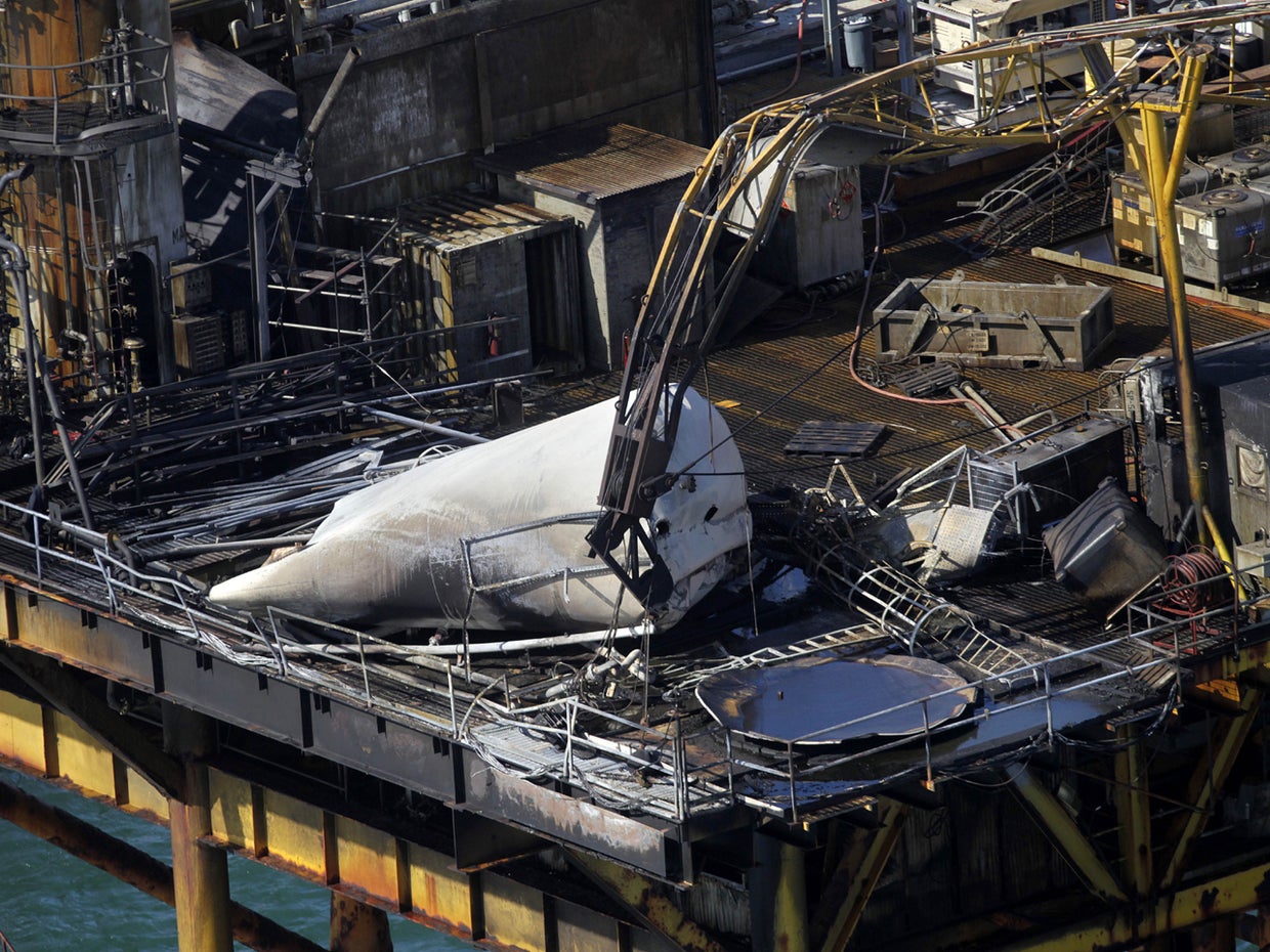Coast Guard: Body found near burned Gulf oil rig - CBS News
